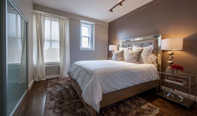 a bedroom with a large bed